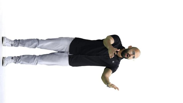 A man, on a white background, in full height