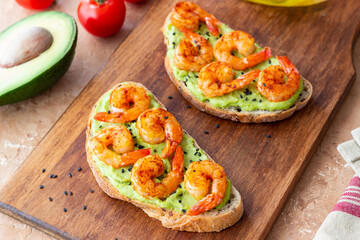 Sandwiches with shrimp and guacamole. Healthy eating. Diet. Breakfast.