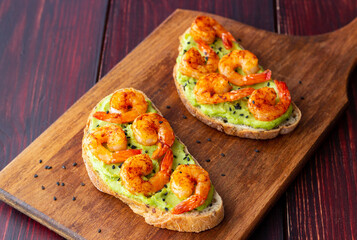 Sandwiches with shrimp and guacamole. Healthy eating. Diet. Breakfast.