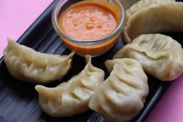 Veg steam momo, Nepalese Traditional dish Momo stuffed with vegetables and then cooked and served with sesame sauce
