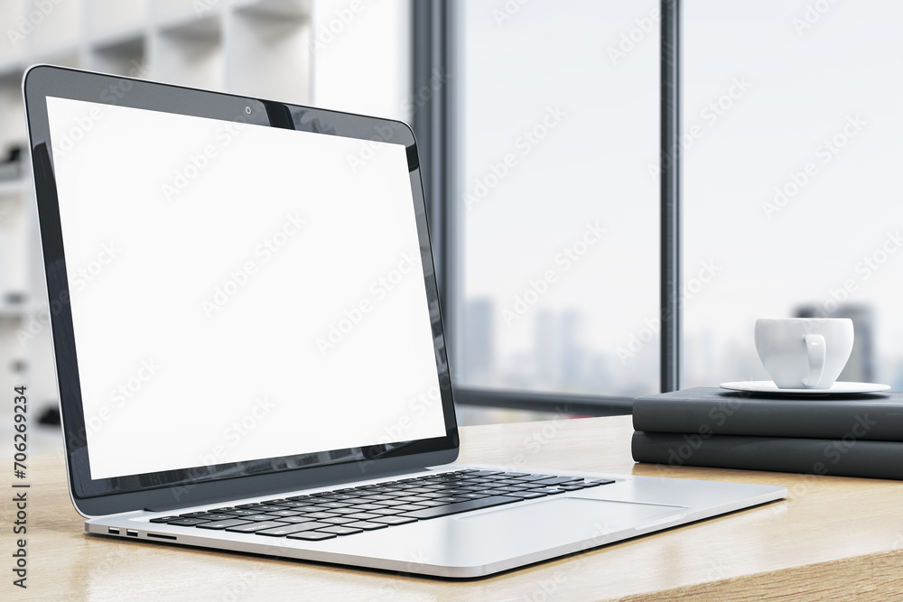 Poster side view of modern designer office desktop with empty white mock up laptop screen, coffee cup and o