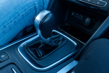 detail of the gear shift lever on a car