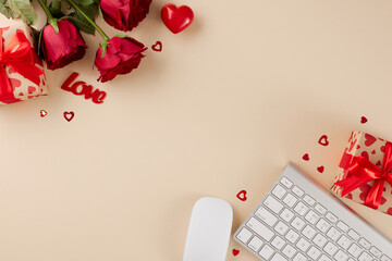 Valentine's day gift shopping online. Top view shot of keyboard, computer mouse, present boxes, red roses, hearts on light beige background with promo zone