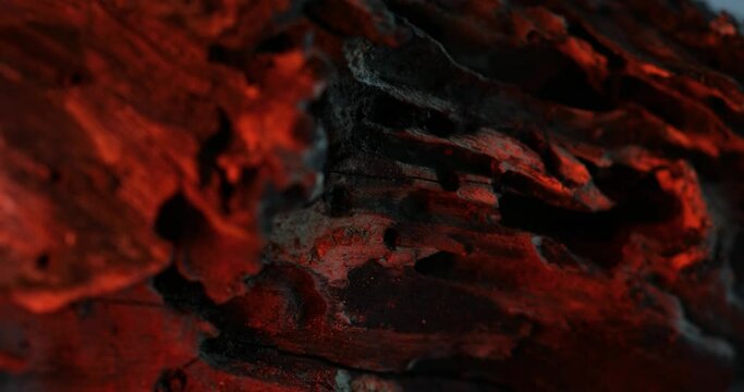Reflections of Fire on Old Wood. Close-up, shallow dof.