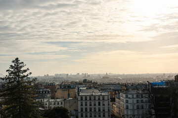Fototapeta na wymiar Paris panorama skyline photo. Silhouettes of Paris landmark architecture building during a sunny winter day, view from Montmartre hill.
