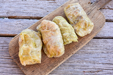 Cabbage rolls with meat, rice and vegetables. Stuffed cabbage leaves with  ground beef. Known as sarma, golubtsy, dolma.