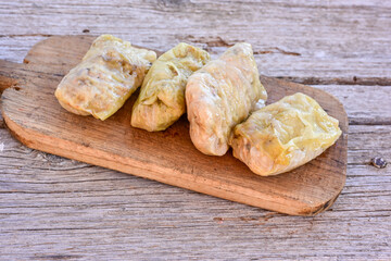 Cabbage rolls with meat, rice and vegetables. Stuffed cabbage leaves with  ground beef. Known as sarma, golubtsy, dolma.