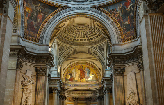 Wide angle photo with the interior details and the painted ceiling of the Paris Pantheon landmark building. Travel to France.