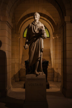 The statue monument of Voltaire, a French Enlightenment writer, philosopher (philosophe), satirist, and historian inside Pantheon building.