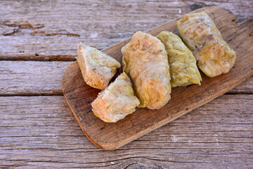 Cabbage rolls with meat, rice and vegetables. Stuffed cabbage leaves with  ground beef. Known as sarma, golubtsy, dolma.