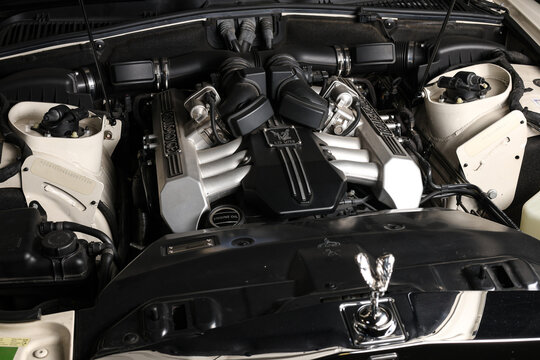 Rolls-Royce Phantom engine. Close up photo with the V12 engine on this luxury car. Rolls-Royce concept logo image.