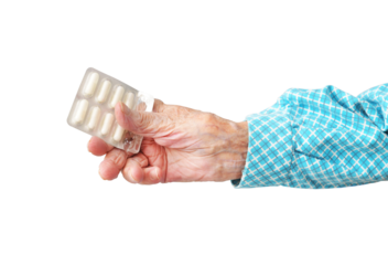 95 year old woman holding pills in hand, isolated on white background.Rheumatoid polyarthritis of the hands.