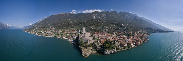 Malcesine and Lago di Garda aerial view, Veneto region of Italy. Malcesine is a small town on the...