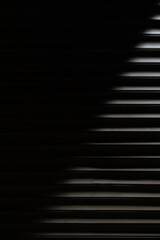 Dark diagonal vertical background with lines. Phone wallpaper. Copy space