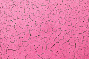 Cracked and peeling pink paint background. Template for designer