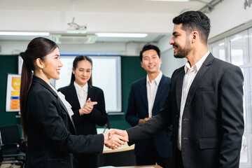 Asian business people team analyzing statistics financial. Team of businesspeople Meeting Conference Discussion Corporate Concept in office.