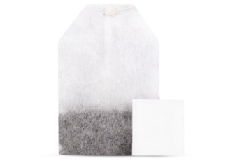 Tea bag with tag isolated on transparent background.