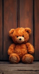 Cozy Companions: Teddy Bear Resting on Wooden Background, Rustic Charm: Teddy Bear Nestled Against a Wooden Backdrop, Woodland Whimsy: Adorable Teddy Bear Resting on Wooden Surface.