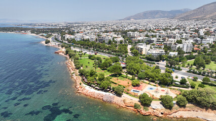 Fototapeta premium Aerial drone photo of famous seascape of Athens Riviera with crystal clear beaches, Voula, Saronic gulf, Attica, Greece