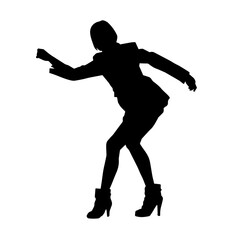 Silhouette of a slim female in dance pose. Silhouette of a woman dancing.