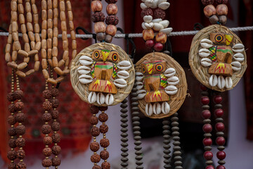 Beautiful Bengali traditional jewelery, works of handicraft, for sale during Handicraft Fair in Kolkata. Selective focus.