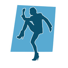 Silhouette of a slim female in dance pose. Silhouette of a woman dancing.