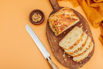 Fresh bread with pumpkin seeds. Home baking concept. Autumn decor