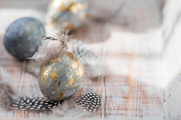 Happy Easter 2024. Stylish grey Easter eggs in the color of marble, concrete, gold and beautiful...
