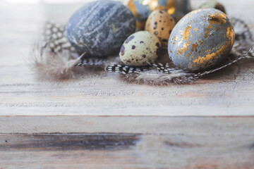 Happy Easter 2024. Stylish grey Easter eggs in the color of marble, concrete, gold and beautiful...