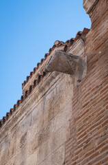 rain gutter on stone wall of historic building