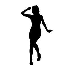 Silhouette of a slim female in dance pose. Silhouette of a woman dancing.