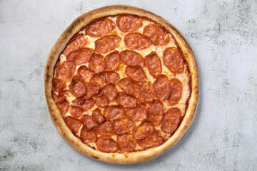 Top view pepperoni pizza,isolated.Italian food