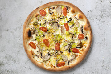 Top view italian pizza isolated.Pizza with cherry tomatoes,mashrooms,sousage and salad.