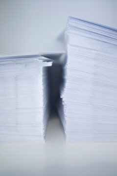 Two Stacks of White Envelopes
