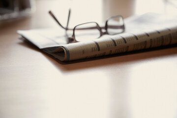 Eyeglasses on Newspaper
