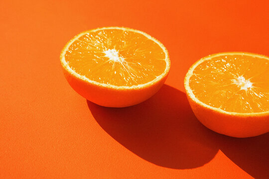 Halved Orange on Orange Background
