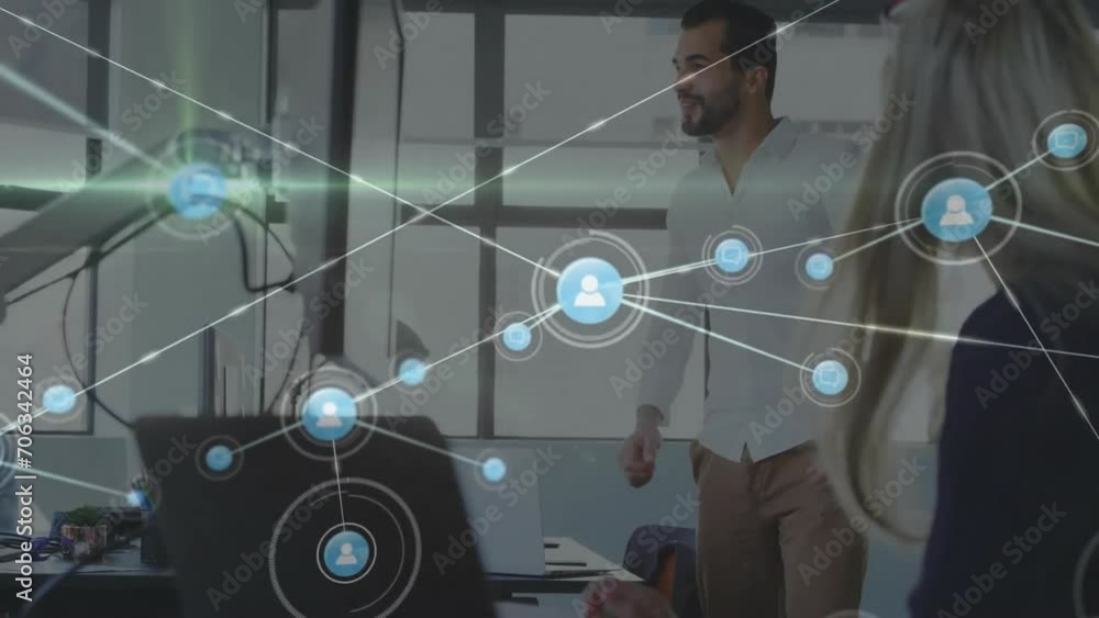 Poster animation of network of connections over diverse colleagues using laptops in office