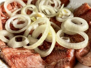 salted herring with white onion