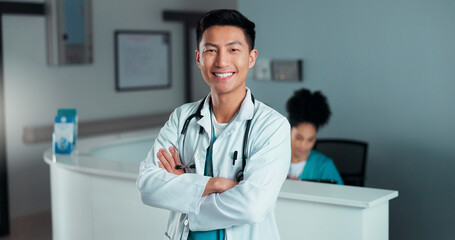 Happy, doctor arms crossed and Asian man, nurse or surgeon with career smile, job experience or...