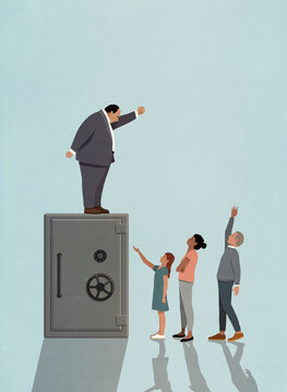 Large man standing on top of vault, looming over people with arms outstretched
