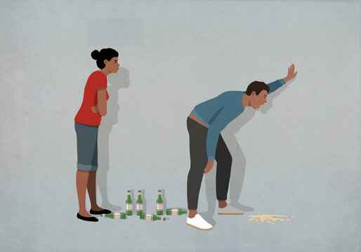 Frustrated wife watching drunk husband vomiting

