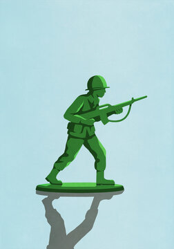 Green soldier with rifle toy on blue background
