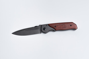 A portable knife on a white background.