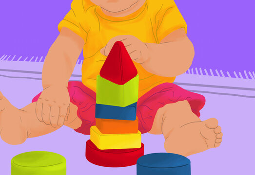 Close up baby girl stacking block toys

