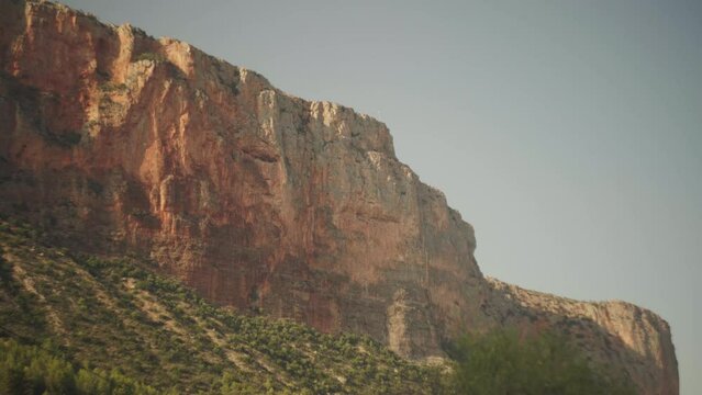 High imposing limestone tuffa column cliffs of Leonidio Greece, static establishing