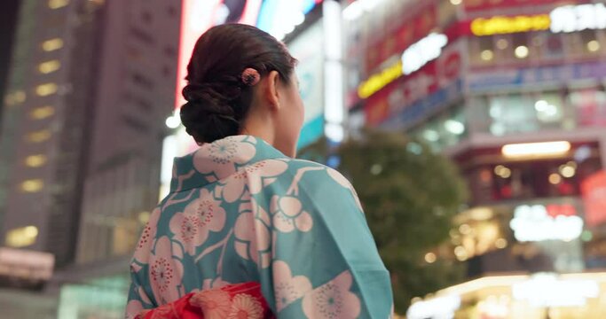 Japan woman, happy and view in city with kimono, travel and leisure in heritage celebration in positive attitude. Person, smile or traditional clothes by town buildings or journey in tokyo culture