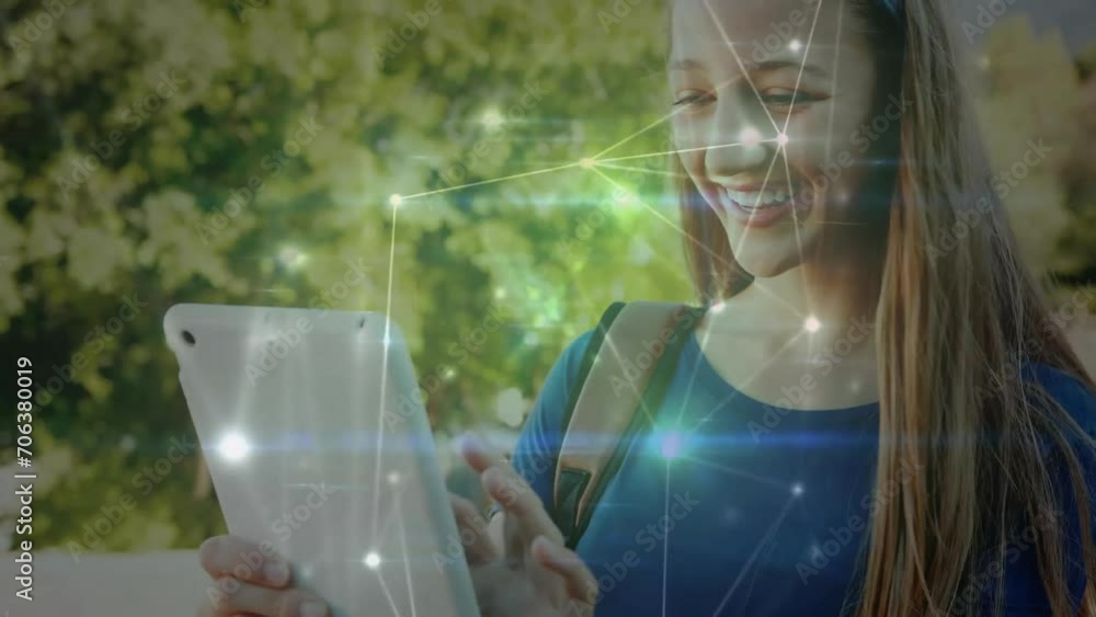 Aufkleber animation of network of connected circles over happy caucasian girl using tablet