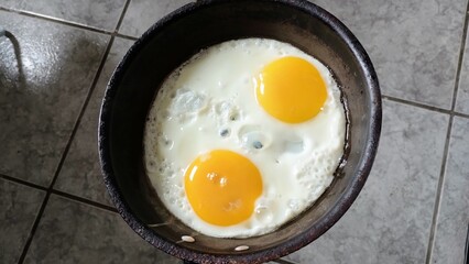 fried egg in a frying pan