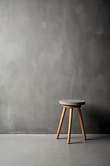 Fototapeten Lone stool in a gray-walled minimalist setting AI generated illustration © ArtStage