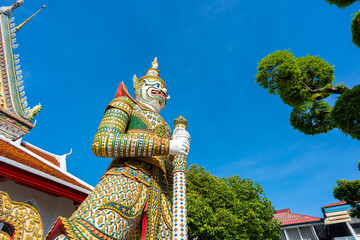 Gates to Ordination Hall with statues of Giants, demon guardians at Wat Arun